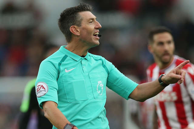Referee Lee Probert gestures during AFC Bournemouth's away match to Stoke City.